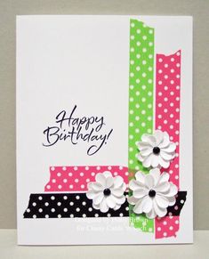 a birthday card with flowers and polka dots