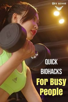 a woman holding two dumbs in her right hand with the words quick biohacks for busy people