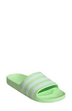 A comfortable pair of slide sandals feature a contoured footbed for support..Open toe.Slip-on style.EVA upper and sole.Imported.Item #6612524 Adidas Slides With Cushioned Footbed, Comfortable Adidas Slip-on Slides, Green Non-slip Synthetic Slides, Adidas Synthetic Slip-on Slides, Adidas Slides For Swimming In Summer, Comfortable Green Slides With Textured Footbed, Adidas Slides For Summer Swimming, Adidas Slides With Branded Insole, Comfortable Green Slide Slippers