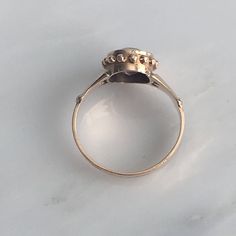 Details: Lovely Victorian Rose Gold Amethyst ring in 10k Gold. This piece is so sweet, and in remarkable condition. It is very feminine and has lovely details. There are no markings on the inside of the band. Measurements: Ring is a size US 6 and can be sized for a fee. The band itself is 2.9mm in width, and the setting including the amethyst is 11mm x 9mm (the amethyst measures 8.75mm x 6.75mm). Condition: The overall all condition of this ring is excellent. Please ask all questions prior to pl Antique 14k Gold Amethyst Ring, Classic Hallmarked 14k Gold Moonstone Ring, Antique 14k Rose Gold Rings, Vintage 14k Gold Moonstone Ring For Anniversary, Heirloom Amethyst Ring With Center Stone In 14k Gold, Heirloom 14k Rose Gold Jewelry With Rose Cut Diamonds, Heirloom 14k Gold Amethyst Ring With Center Stone, Victorian Rose Gold Ruby Ring, Heirloom 14k Stamped Amethyst Jewelry