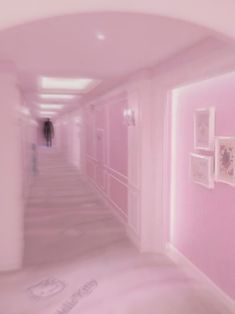 a pink hallway with hello kitty decals on the walls