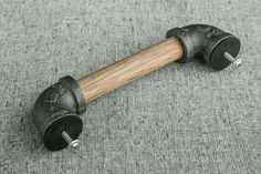 an old style hammer is laying on the floor