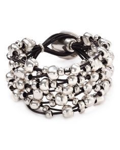 Unconventionally radiant, Uno de 50's masterful bracelet has a bubbly, weekend-right charm. Adjustable Multi-strand Polished Beads Bracelets, Silver Jewelry With Round Beads For Fashion, Adjustable Metal Jewelry With Large Beads, Metal Bracelet With Polished Beads, Polished Metal Bead Bracelet, Modern Silver Beaded Bracelets, Modern Adjustable Jewelry With Polished Beads, Elegant Bracelet With Large Beads, Elegant Large Beads Bracelet Jewelry