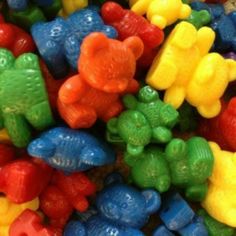 there are many different colored gummy bears together