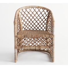 a wicker chair sitting on top of a white floor