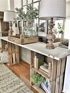 a living room filled with lots of furniture and decor on top of a wooden table