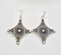 "Moroccan Berber Filigree Sterling Silver Dangle Earrings This is a great authentic Filigree jewelry from Morocco. Each earring measures just over 2.5\" long and just under 1''.5 wide./ 11.gr The workmanship is wonderful .These earrings were hand made sterling silver 925 new high-silver content if you have any questions - Feel free to contact me. . Thank you for visiting my shop All my jewelry has been collected over 20 years ago .I will be listing more pieces shortly as I am constantly always w Nickel Free Silver Danglers, Nickel-free Sterling Silver Drop Danglers, Nickel-free Sterling Silver Silver Danglers, Traditional Silver Earrings With Ear Wire, Silver Dangle Danglers, Silver Drop Danglers, Silver Drop Earrings For Gift, Unique Silver Danglers As Gift, Silver Teardrop Danglers For Gift