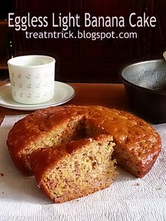 there is a bundt cake that has been cut in half and served on the table