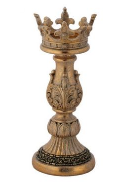 a gold metal candle holder with a crown on top and an ornate design around the base