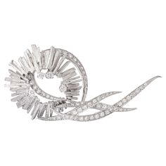 Diamond and white gold 18K Brooch stylized design. 66 diamonds. Total approximately 1.39 carats. Circa 1960. Total length: 6.00 centimeters. Width: 0.10 centimeters up to 3.20 centimeters Total weight: 21.09 grams. 1960s Aesthetic, Aesthetic Movement, Diamond White, 1960s, Diamonds, White Gold, Gold, White, Design