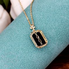 "❤Jewelry Details -Gold Type : 14k two tone gold Center Stone: Natural Black Onyx 8*11mm, Approximately 2.8ct Cut: Emerald Cut / 3EX Stone Type: Diamond,0.03ctw Color: G-H Clarity: SI1 Cut: Round Cut / 3EX -Pendant Width: 10mm -Pendant Height: 18.2mm -Chain Length: 40+2+3cm -Or Without Chain SKU: YP0028 ❤The link for the same style ring is https://www.etsy.com/listing/933531377/emerald-cut-natural-black-onyx-ring?ref=shop_home_active_1&frs=1 ❤The link for the same style earrings is https://w Black 14k Gold Pendant Jewelry, Black Enamel 14k Gold Necklace, Black 14k Gold Tarnish Resistant Necklace, Black 14k Gold Jewelry With 17 Jewels, Gold Onyx Pendant Jewelry, Black 14k Gold Tarnish-resistant Necklace, 14k Gold Black Tarnish-resistant Necklace, 14k Gold Black Jewelry With 17 Jewels, Black Gold Plated Jewelry Gift