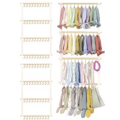 a rack with ties hanging from it and two rows of hangers on the wall