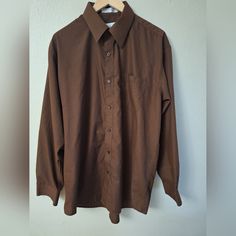 Men's Daniel Ellissa New York Dark Brown Dress Shirt. Neck Size 16 1/2. Sleeve Length 34-35. In Excellent Condition! Practically Brand New. Only Worn Once For A Wedding. Formal Brown Shirt For Spring, Formal Brown Spring Shirt, Brown Cotton Business Casual Shirt, Brown Cotton Shirt For Business Casual, Classic Brown Business Tops, Classic Brown Collared Shirt, Brown Collared Business Tops, Classic Brown Tops For Business, Vintage Long Sleeve Business Shirt