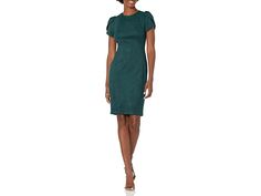 Calvin Klein Essential Sleeveless Sheath - Women's Dress : Malachite Suede Tulip Sleeve : 94% Polyester, 6% Spandex 94% poly, 6% spandex 90% Polyester, 10% Spandex Viet Nam Dry Clean Only flattering fit A great wear to work dress that is perfect for desk to dinner tulip sleeve detail Zipper closure sheath silhouette Green Stretch Bodycon Dress For Work, Stretch Bodycon Dress For Work, Stretch Sheath Bodycon Dress For Work, Stretch Bodycon Dress For Office, Stretch Elastane Bodycon Office Dress, Stretch Elastane Bodycon Dress For Office, Stretch Elastane Bodycon Dress For Work, Fitted Bodycon Dress With Structured Shoulders For Formal Occasions, Formal Fitted Bodycon Dress With Structured Shoulders