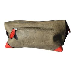 Immerse yourself in authentic luxury with this green and red cowhide leather case, the ideal companion for organizing and carrying your essentials with style and sophistication. Made from the highest quality cowhide leather, this pencil case embodies craftsmanship and durability. Cowhide leather, renowned for its strength and suppleness, offers a rich texture and natural patina that improves with time, adding a dimension of character to your pencil case. The sleek, timeless design of this pencil Leather Travel Pencil Case With Zipper Pouch, Green Leather Pouch As Gift, Green Leather Pouch For Gift, Everyday Green Leather Pouch, Leather Rectangular Pencil Case For Travel, Red Rectangular Pencil Case For Travel, Rectangular Red Pencil Case For Travel, Rectangular Leather Pencil Case For Travel, Red Rectangular Travel Pencil Case