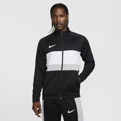 This track jacket reimagines classic soccer gear, with throwback color blocking and a paneled construction. Designed with a classic fit and moisture-wicking technology, it combines soft knit and smooth ripstop to give a mixed-material look. Soccer Gear, Tracksuit Jacket, Workout Jacket, Mens Activewear, Track Jacket, Track Jackets, White Style, Nike Dri Fit, Soft Knits