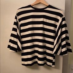 Cotton Black White Striped Flowing Sleeve Tee Never Used Size S But Fits A Bit Loosely Will Fit M Black And White Crew Neck Tops For Spring, Black And White Short Sleeve Top For Spring, White Striped Shirt Outfit, Slasher Summer, Outfits With Striped Shirts, Black And White Striped Shirt, Black And White Striped Top, Black And White Tees, White Stripes Shirt