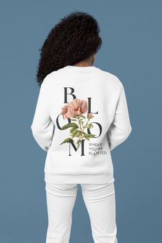 Celebrate Mother's Day with a touch of inspiration and comfort! Our 'Bloom Where You Are Planted' sweatshirt is the perfect way to honor the special woman in your life. Crafted with love, this cozy pullover is not just a piece of clothing; it's a message of strength and growth. Made from soft, high-quality material, it's designed to provide warmth and comfort, whether she's relaxing at home or out running errands. Luxurious comfort and style are what this unisex, garment-dyed sweatshirt is all about. It's made with 80% ring-spun cotton and 20% polyester and the fabric is 3-end garment-dyed, ring-spun, color-blast fleece with a 100% cotton face. Each sweatshirt comes with a relaxed fit, a rolled-forward shoulder, and a back neck patch.  .: 80% ring-spun cotton, 20% polyester .: Medium-heavy Bloom Where You Are Planted, Cozy Gift, Cozy Pullover, Plant Design, Mom Outfits, Running Errands, Piece Of Clothing, Gifts For Women, Mothers Day