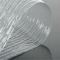 an abstract sculpture with wavy lines on it