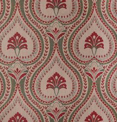 a red and green pattern on fabric