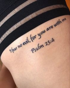 a woman's thigh with a tattoo saying, i fear no evil for you are with me