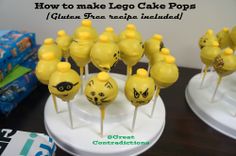 there are many yellow cake pops with faces on them