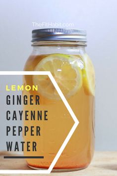 a mason jar filled with lemon ginger cayenne pepper water