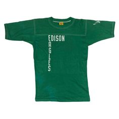 Vintage 70s USA high school football top Edison Eagles green single stitch t shirt size large  Authentic piece from the 70s washed out and faded I places but still very much a good piece of Americana vintage  Size label states large, fits as an oversized medium  Pit to pit: 18.5" Collar to hem: 27.5" Green T-shirt For Football Season, Green Sports Season T-shirt For Fan Gear, Green T-shirt With Team Name For Fans, Green T-shirt For Sports Season Fan Gear, Green Collegiate Sports T-shirt, Green Football Season Sports T-shirt, Green Collegiate T-shirt For Sports Events, Collegiate Green T-shirt For Sports Events, Green T-shirt With Team Name For Game Day