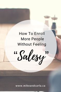 a person holding a cell phone with the words how to enroll more people without feeling sales