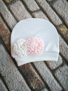 This item is available in primary color: pink, secondary color: beige. We designed and made beanie baby hats from newborn soft cotton fabric for new mom and babies maybe baby shower gift.    #babyheadband #babybeanie #newbornbabybeanie #infantbeanie  #newbornbabyhat #babyshowergift #babytiara #babygirlwrap #newmomgift  #newmomtiara #birthgiftformom #babyshowergift #newbabygift Cute Soft Hats Perfect As Gifts, Cute Soft Hats For Gifts, Adjustable Soft Hat For Gifts, Adjustable Soft Hat As A Gift, Soft Adjustable Hat As A Gift, Adjustable Soft Cream Hat, Adjustable Cream Soft Hat, Cotton Hat, One Size Fits Most, Soft Cotton Cap