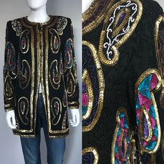 Fierce and fabulous! All eyes will be on you when you walk into a room shining in this glamorous vintage jacket. Luxurious jacket adorned with beads and sequins in a rich pattern. Beading and sequins are in good condition but may have a few missing throughout garment. Glamorous Beaded Party Outerwear, Vintage Beaded Party Outerwear, Vintage Festive Party Outerwear, Festive Vintage Party Outerwear, Vintage Festive Sequin Outerwear, Vintage Sequined Outerwear For Festive Occasions, Vintage Sequined Outerwear For Festive Season, Luxury Coat, Beautiful Nightgown