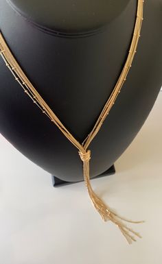 This 6 layered Chico's lariat necklace is bright and fun.  The choker part is 21 inches and the additional tassel is 11 inches .  This is a beautiful piece that is in fabulous condition.  It is signed with a tag at the clasp.  It is a great necklace to fritter with. I specialize in finding fun high quality fashion jewelry.  Please browse my shop for more options. Bohemian Necklace With Adjustable Length For Parties, Bohemian Party Necklace With Adjustable Length, Bohemian Lariat Necklace With Clavicle Chain For Parties, Bohemian Multi-strand Lariat Necklace With Adjustable Chain, Adjustable Dangle Tassel Necklace For Party, Bohemian Lariat Necklace With Dangle For Party, Adjustable Multi-strand Lariat Necklace For Party, Adjustable Dangle Drop Necklace For Party, Adjustable Double Strand Layered Necklace For Party