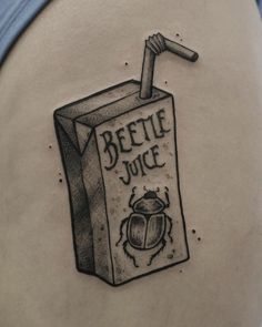 a drawing of a juice carton with a straw in it and the words beetle juice on it