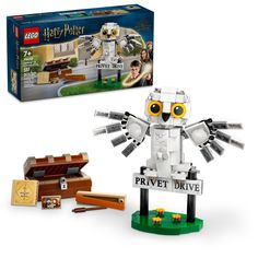 the lego harry potter set is in its box and next to it's contents