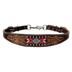 a brown leather dog collar with an embroidered design