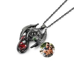 This is a mysterious necklace, personalized for the moment you love most on a projection necklace! Beautifully handcrafted in sterling silver, this necklace features a personalized photo projection stone guarded by a dragon. His 3D wings, ears, and bright green eyes are captured in amazing detail as he is on your neck. Hide your photo in the necklace, you can see the photo inside the necklace, or you can use it to illuminate the light and project your photo on the wall. This customized projectio 3d Wings, Projection Necklace, Red Necklace, Necklace Online, Engraved Necklace, Stone Heart, Necklace Personalized, Anniversary Sale, Red Garnet