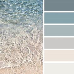 the color scheme is blue and gray, with white waves coming in from the ocean