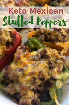 a close up of stuffed peppers on a plate with the words keto mexican stuffed peppers