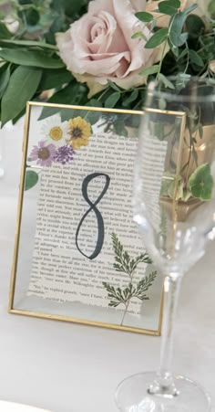 Wedding table numbers in a gold floating clasp frame with a Jane Austen book page & dried flowers pressed inside. Pressed Flower Table Numbers, Pressed Flower Table, Bookish Wedding, Flower Table Numbers, Flower Table, Garden Party Wedding, Wildflower Wedding