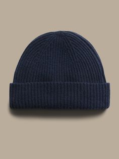 Inspired by fisherman's hats from the turn of the century, this luxuriously soft and warm cashmere beanie is designed in a shorter length so it sits higher up.  Ribbed knit design adds softness and a luxe texture.  Length: 9. 25" (23. 5cm) Classic Cashmere Soft Knit Hat, Cashmere Soft Knit Beanie, Knitted Cashmere Beanie Hat, Winter Knitted Cashmere Hat, Winter Cashmere Knitted Hat, Classic Beanie Hats For Fall, Classic Beanie For Fall, Classic Cashmere Winter Hat, Classic Soft Knit Hat For Everyday