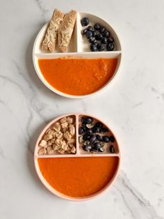 two bowls filled with different foods on top of a white countertop next to each other