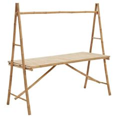 a wooden shelf with a ladder on it and a bench underneath the shelf for storage