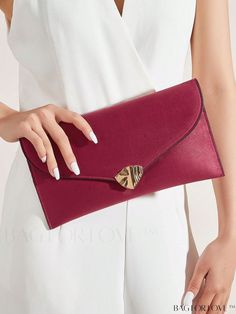 BagForLove - Burgundy Metal Decor Clutch: Stylish Medium Envelope Bag for Daily Use Product Description Color Burgundy Details Frill Type Square Bag Bag Size Medium Strap Type Chain Pattern Type Plain Style Minimalist Composition 100% Polyester Material Polyester Size Chart INCH CM Strap Length Bag Length Bag Width Bag Height 46.5 inch 10.6 inch 0.8 inch 5.9 inch Strap Length Bag Length Bag Width Bag Height 118 cm 27 cm 2 cm 15 cm Details Pictures Similar Products h2 { text-align: center; } /* æ Elegant Bags With Removable Pouch For Valentine's Day, Envelope Evening Bag As Gift, Envelope Evening Bag For Gift, Clutch With Magnetic Closure As Gift, Envelope Clutch For Daily Use, Chic Red Envelope Bag, Elegant Bags For Daily Use And Valentine's Day, Elegant Bags For Daily Use On Valentine's Day, Elegant Bags For Valentine's Day