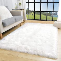 PRICES MAY VARY. 🐑【Faux Fur Rug with Material】The white area rugs are made of premium durable faux sheepskin fur, extra thick and soft-touch features our carpet the superior fluffy hand-feel. Friendly to any age people or pets, no stimulation. 🐑【Non-slip Backing】Slip-resistant suede leather is used for the bottom side with great sewing, keeping the fuzzy rug fastened to the floor. It guarantees both stability and beauty. 🐑【 Perfect Size 】TENNOLA faux sheepskin rug is approx 36in x 59in, perfe Nursery Room Luxury, Fuzzy White Rug, Fur Rug Bedroom, Rug Fuzzy, White Fluffy Rug, Luxury Room Decor, White Faux Fur Rug, Comfy Rugs, Area Rugs For Bedroom