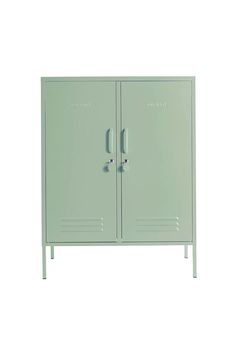 a green metal cabinet with two doors