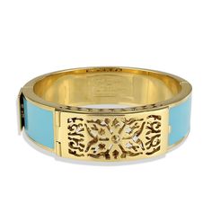 Turquoise "Un Rêve" Perfume Bracelet T: Introducing the 'Un Rêve Bracelet' by Thompson Ferrier, a fusion of luxury jewelry and perfume that redefines personal fragrance. This unique piece lets you carry your favorite scents stylishly with you throughout the day, eliminating the need to spray directly on your skin. The bracelet is meticulously crafted with 18-karat gold plating on brass, exuding an air of sophisticated elegance. It is 7 inches in length and .75 inches wide, designed to comfortabl Luxury Turquoise Bangle Bracelets, Elegant Turquoise Bangle For Wedding, Elegant Turquoise Jewelry With Bracelet Strap, Elegant Turquoise Bangle For Formal Occasions, Luxury Blue Cuff Bracelet, Elegant Turquoise Bangle For Gift, Elegant Turquoise Cuff Bracelet Gift, Elegant Turquoise Cuff Bracelet For Gift, Elegant Turquoise Cuff Bracelet As Gift