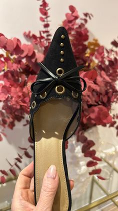 Featuring a pointed toe and kitten heel design, what's not to love about the Charisma Kitten Heel? Work these into your date night options for a subtle but chic way to up your style game! Faux Suede Low Kitten Heel Mule Studded Eyelet Detail Faux Leather Bow Tie Heel Height: 3.75" True to Size Leather Bow Tie, Tie Heels, Childrens Shop, Heel Design, Beach Collection, Leather Bow, Leather Bows, Kitten Heel, Designer Heels