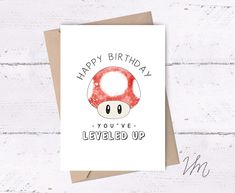 a birthday card with an image of a mushroom on it and the words happy birthday you've level up