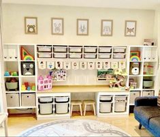 a child's playroom with toys and storage bins