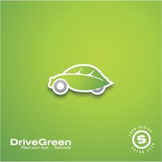 a green car with a leaf on the hood is in front of a green background